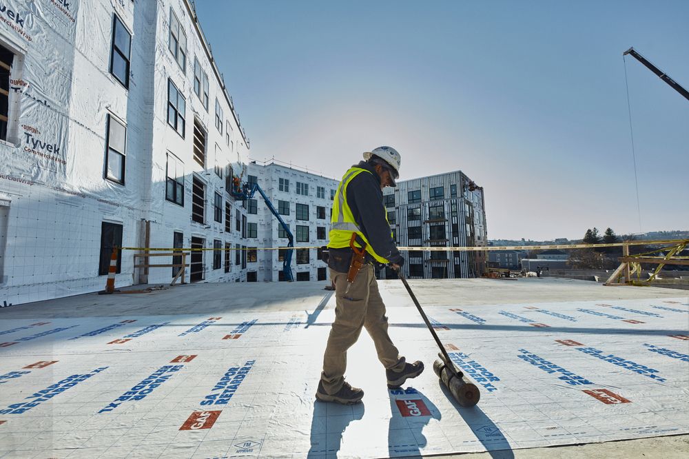 Roofing crew on a residential roof
